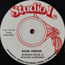 Burning Spear & Roland...